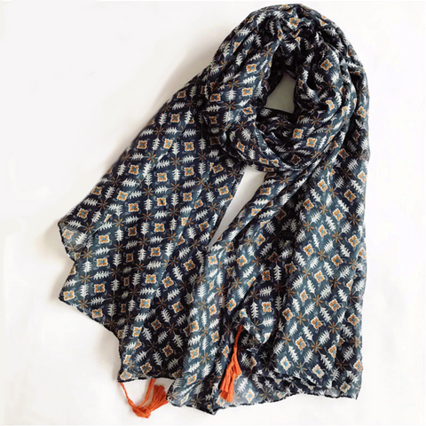 Elevate every outfit with this versatile Floral & Geometric Print Scarf Shawl Wrap with Tassels. This is the new Bohemian vibe - a romantic and practical in two color print